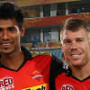 Mustafizur Rahman with David Warner