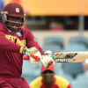 Chris Gayle smashes a boundary against Zimbabwe Chris Gayle smashes a boundary against Zimbabwe