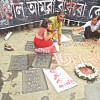 Indian social activists light candles during a protest in Kolkata on Saturday, against a fatal attack on a restaurant in the Bangladeshi capital Dhaka. Indian social activists light candles during a protest in Kolkata on Saturday, against a fatal attack on a restaurant in the Bangladeshi capital Dhaka.