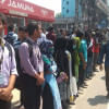 Students form human chain on Dhaka Progati Sarani Students form human chain on Dhaka Progati Sarani
