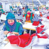 Wage board for garment workers Garment factory owners revise minimum wage upwards to Tk 12,500