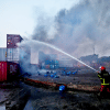 Firefighters trying to put out fire at the BM Container depot in Sitakunda