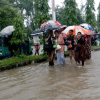 People looking for shelter in the flood, photo taken in Akhalia area of Sylhet