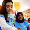Bidya Sinha Mim serves customers at Bidyanondo’s store Bidya Sinha Mim serves customers at Bidyanondo’s store