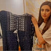 Mim buys burnt clothes to aid Bangabazar victims Mim buys burnt clothes to aid Bangabazar victims