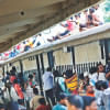 In the rush to get home for Eid, people jostle for seats at a stationary train at Kamlapur Railway Station. In the rush to get home for Eid, people jostle for seats at a stationary train at Kamlapur Railway Station.