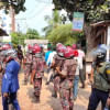 2 policemen injured as RMG workers and cops clash in Gazipur