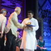 Korvi Rakshand receives the award. Photo: JAAGO Foundation Korvi Rakshand receives the award. Photo: JAAGO Foundation