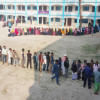 Voter turnout 27.15pc till 3:00pm: EC Voters stand in lines to cast their votes at a polling centre in Narayanganj's Rupganj