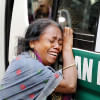 Death came draped in smoke Sheuli Das weeps as she holds onto the ambulance carrying the bodies of her niece Poppy Roy and two grandchildren, after they died in a fire on Bailey Road in the capital on Thursday night.
