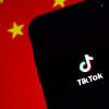 TikTok over Chinese flag TikTok over Chinese flag