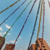 Rows of festival decoration against a cityscape Rows of festival decoration against a cityscape