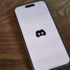 discord logo on phone discord logo on phone