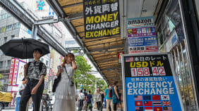 afp dollar yuan yen.jpg