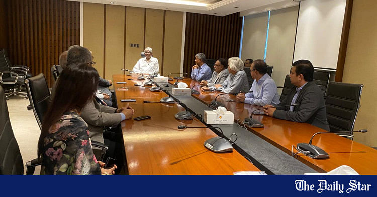 Business leaders meet with finance adviser