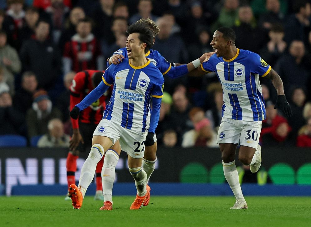 Brighton & Hove Albion's Kaoru Mitoma celebrates scoring their first goal with Jeremy Sarmiento and Pervis Estupinan. Photo: Reuters