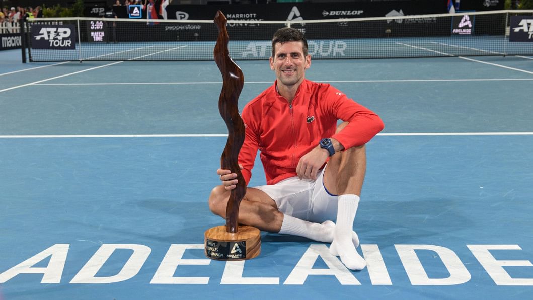 Serbian tennis player Novak Djokovic celebrates after winning the final of the ATP Adelaide International tournament against Sebastian Korda of the US in Adelaide on January 8, 2023.