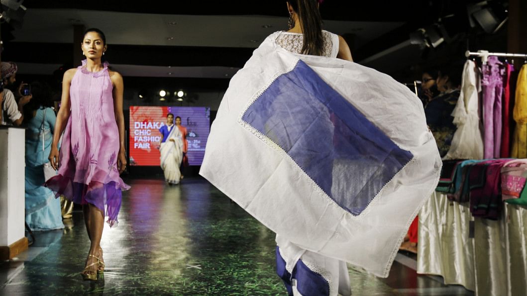 Models walking through a ramp.