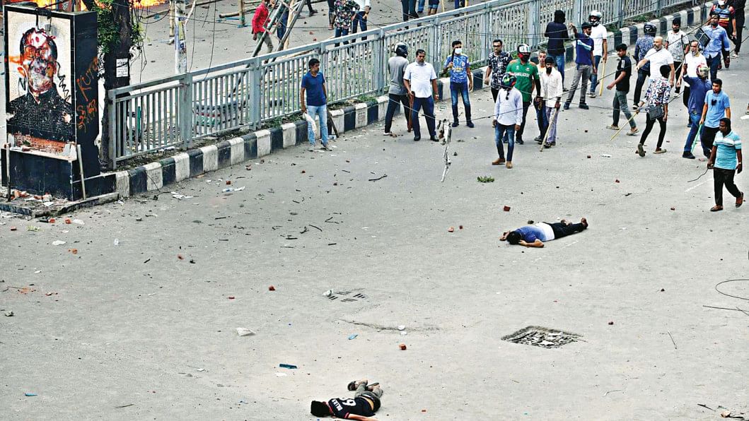 bullet-hit persons lie motionless on the street in Azampur of Uttara in Dhaka bullet-hit persons lie motionless on the street in Azampur of Uttara in Dhaka