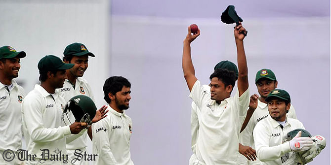 Bangladesh spinner Taijul Islam waves at the spectators while his teammates escort him to the gallery after his 8-wicket-haul against Zimbabwe at Mirpur stadium on Monday. Photo: Firoz Ahmed
