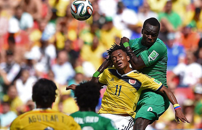 Arthur Boka of the Ivory Coast controls the ball against Juan Guillermo Cuadrado of Colombia during the 2014 FIFA World Cup Brazil Group C match between Colombia and Cote D'Ivoire at Estadio Nacional on June 19, 2014 in Brasilia, Brazil. Photo: Getty Images