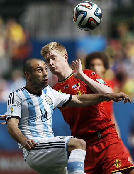 Argentina's midfielder Javier Mascherano (L) vies with Belgium's midfielder Kevin De Bruyne during their quarter-final match in Brasilia during the 2014 FIFA World Cup on July 5, 2014. Photo: Getty Images