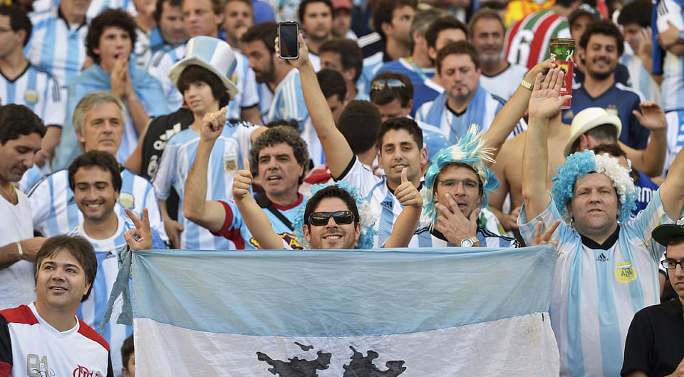 Fans of Argentina react before the 2014 FIFA World Cup final football match between Germany and Argentina at the Maracana Stadium in Rio de Janeiro on July 13, 2014. Photo: Getty Images