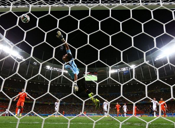 Wesley Sneijder of the Netherlands attempts a shot at goal against Keylor Navas of Costa Rica and hits the crossbar during the 2014 FIFA World Cup Brazil Quarter Final match between the Netherlands and Costa Rica at Arena Fonte Nova on July 5, 2014 in Salvador, Brazil. Photo: Getty Images