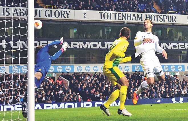 Tottenham Hotspur striker Roberto Soldado (R) heads in one of his three goals against Anzhi Makhachkala during their Europa League match at White Hart Lane on Thursday. Photo: AFP