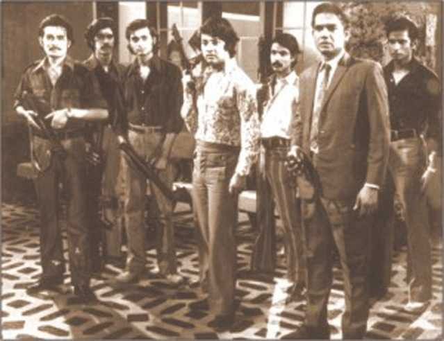Khan Ataur Rahman (2nd from right) in the film  Abar Tora Manush Haw.