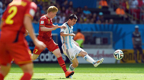 Belgium's midfielder Kevin De Bruyne (L) vies with Argentina's forward Lionel Messi (R) during their World Cup quarter-final match at the Mane Garrincha National Stadium in Brasilia on July 5, 2014. Photo: Getty Images
