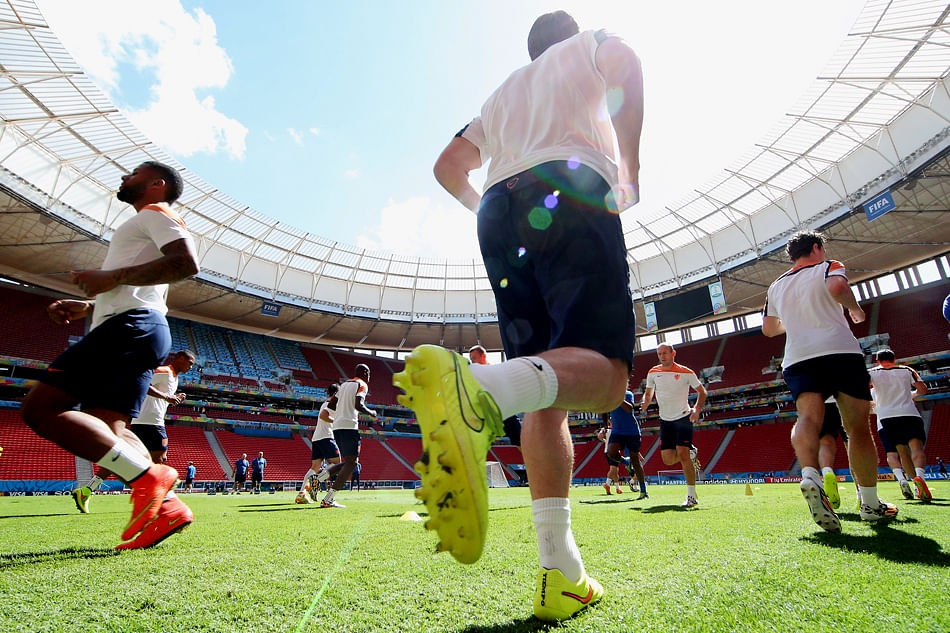 6.	A general view as the players warm up during the Netherlands training session prior to their 3rd Place Playoff match between the Netherlands and Brazil at the 2014 FIFA World Cup at the Estadio Nacional on July 11, 2014 in Brasilia. Photo: Getty Images