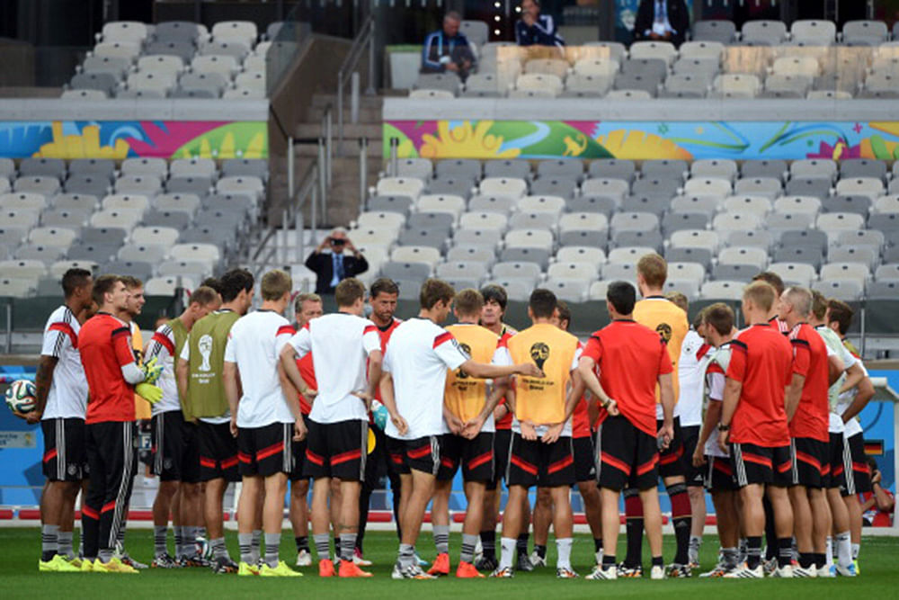 Germany's coach Joachim Loew (C) with his team during a training session at The Mineirao Stadium in Belo Horizonte on July 7, 2014 during the 2014 FIFA World Cup in Brazil. Germany play Brazil in the semi-finals of the 2014 World Cup on July 8. Photo: Getty Images