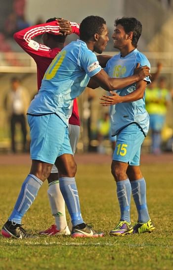 Jamal Hossain's (R) fourth-minute goal gave Abahani a 1-0 win against BJMC at the Bangabandhu National Stadium yesterday. PHOTO: STAR