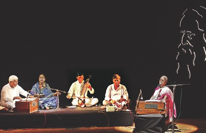 Abdul Wadul (L) and Fahmida Khatun (2-L) perform while Dr. Sanjida Khatun (R) narrates. Photo: Prabir Das