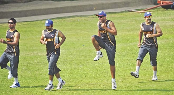 Afghan players limber up at the BCB Academy ground in Mirpur as part of their preparation for a maiden Asia Cup campaign. Photo: Star
