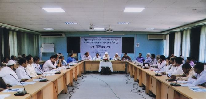 Taposh Kumar, additional secretary of power and energy, attends a discussion on government support for dissemination of modern rice parboiling technology organised by German aid agency GIZ and local rice millers association at Ishwardi Sugarcane Research Institute in Ishwardi yesterday.   Photo: GIZ