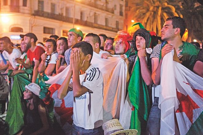 So close, yet so far ... Algerian fans can't take the pain of losing to Germany in extra-time after keeping their opponents at bay for regulation 90 minutes. PHOTO: GETTY IMAGES