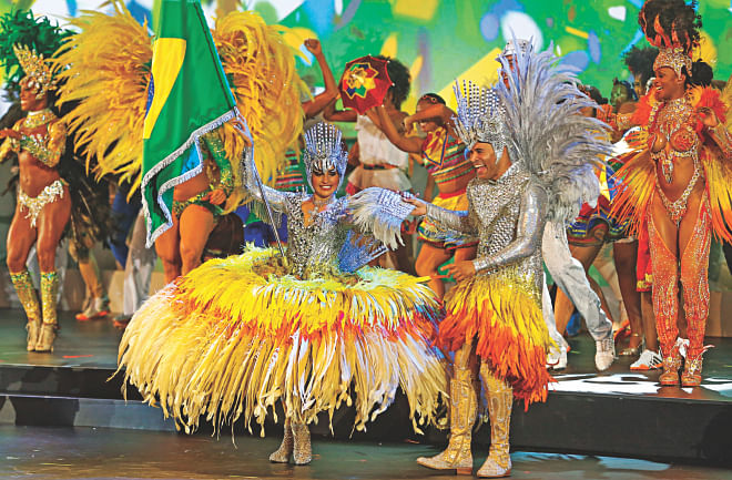 Artists perform during the opening ceremony of the two-day 64th FIFA Congress at the Expocenter Transamerica in Sao Paulo on Tuesday. PHOTO: GETTY IMAGES