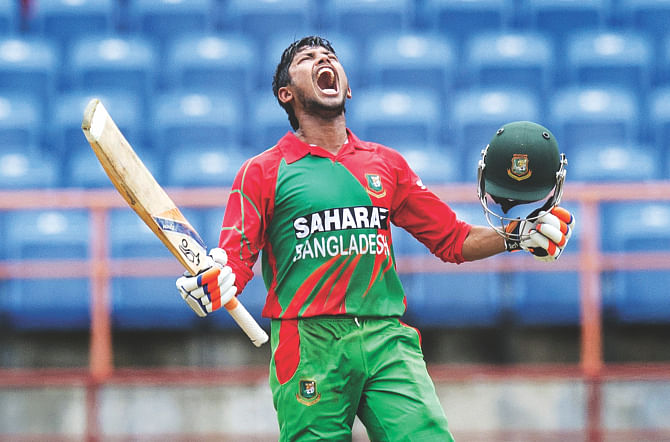 Bangladesh opener Anamul Haque lets out a huge roar after reaching his hundred during the first One Day International against the West Indies at the Grenada National Cricket Stadium in St. George's on Wednesday. Anamul's 109 helped Bangladesh post a challenging score of 217 for nine in 50 overs. PHOTO: AFP