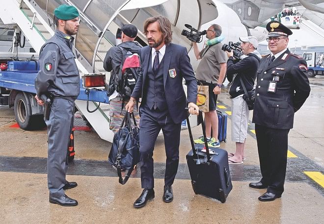 Back home ... Italy's Andrea Pirlo arrives at the Malpensa Airport in Milan on Thursday. PHOTO: GETTY