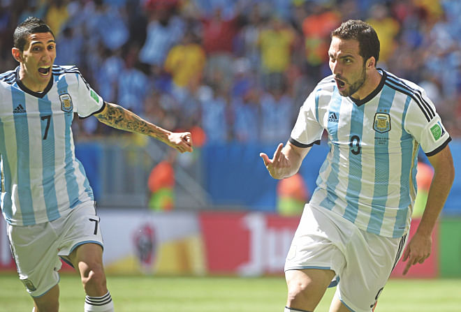 Argentina forward Gonzalo Higuain (R) celebrates his strike against Belgium in the 8th minute in their World Cup quarterfinal in Brasilia on Saturday. Photo: AFP