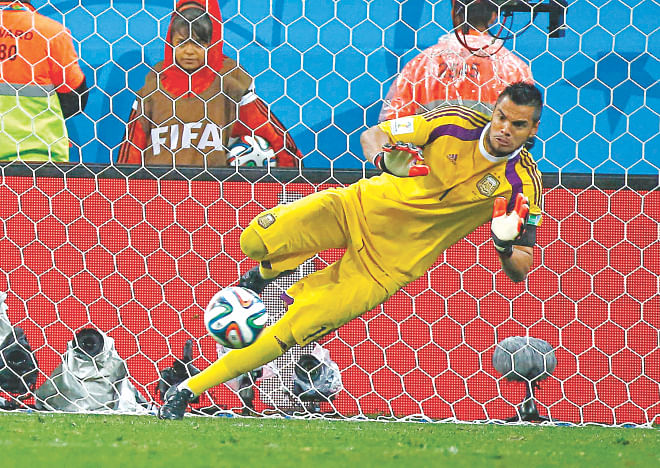 Argentina goalkeeper Sergio Romero made two saves in the shootout to take the Albiceleste to Sunday's World Cup final against Germany with a 4-2 tie-break win over the Netherlands in the second semifinal at The Corinthians Arena in Sao Paulo yesterday.   Photo: Reuters