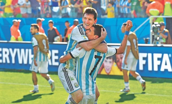 Argentina needed another Midas touch from Lionel Messi (L) to cross the Round of 16 hurdle against Switzerland. This time the Albiceleste superstar made the vital assist for Di Maria to score the 118th minute winner at Corinthians Arena in Sao Paulo yesterday.  PHOTO: AFP