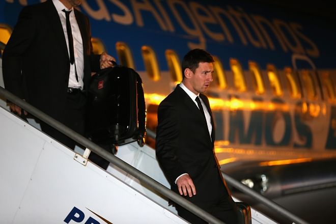 Argentina superstar Lionel Messi deplanes at Tancredo Neves International Airport in Belo Horizonte on Monday night. PHOTO: GETTY IMAGES