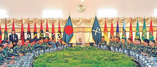 Prime Minister Sheikh Hasina addresses a conference of the generals at the Army Headquarters in Dhaka Cantonment yesterday morning. Photo: PID