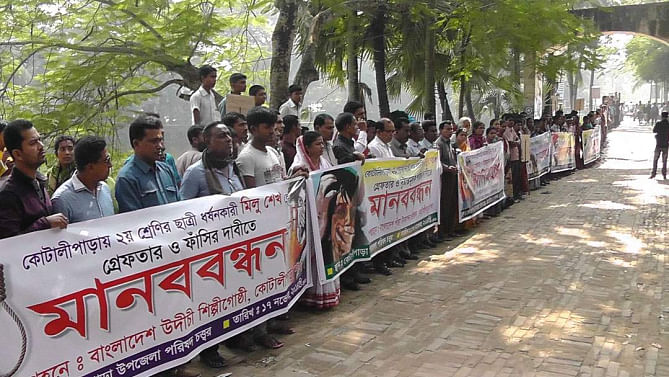 Locals form a human chain in front of Kotalipara upazila parishad complex under Gopalganj district yesterday demanding arrest and punishment of the criminals who raped a girl of Class II on November 8. PHOTO: STAR