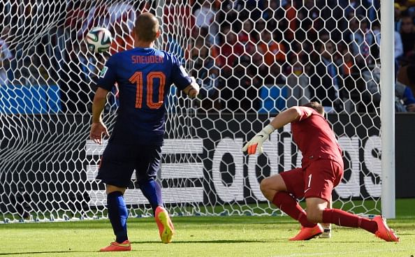 Netherlands' forward and captain Robin van Persie (not pictured) scores during a Group B football match between Australia and the Netherlands at the Beira-Rio Stadium in Porto Alegre during the 2014 FIFA World Cup on June 18, 2014. Photo: AFP/Getty Images