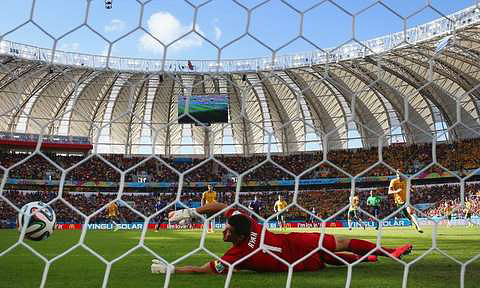 The Dutch go ahead on Memphis Depay long distance strike during a Group B football match between Australia and the Netherlands at the Beira-Rio Stadium in Porto Alegre during the 2014 FIFA World Cup on June 18, 2014. Photo: BBC