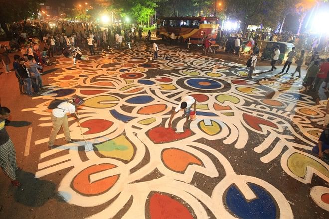 Airtel and the daily Prothom Alo, in association with Berger Paints, organised "Alpona-e Baishakh"-- a street painting, stretching across Manik Mia Avenue -- to celebrate Pahela Baishakh, for the third consecutive year. The programme began in the late hours of yesterday and went on deep into the night, leaving one of the main streets of the capital exploding into bright, joyful colours on the dawn of Pahela Baishakh. Photo: Star